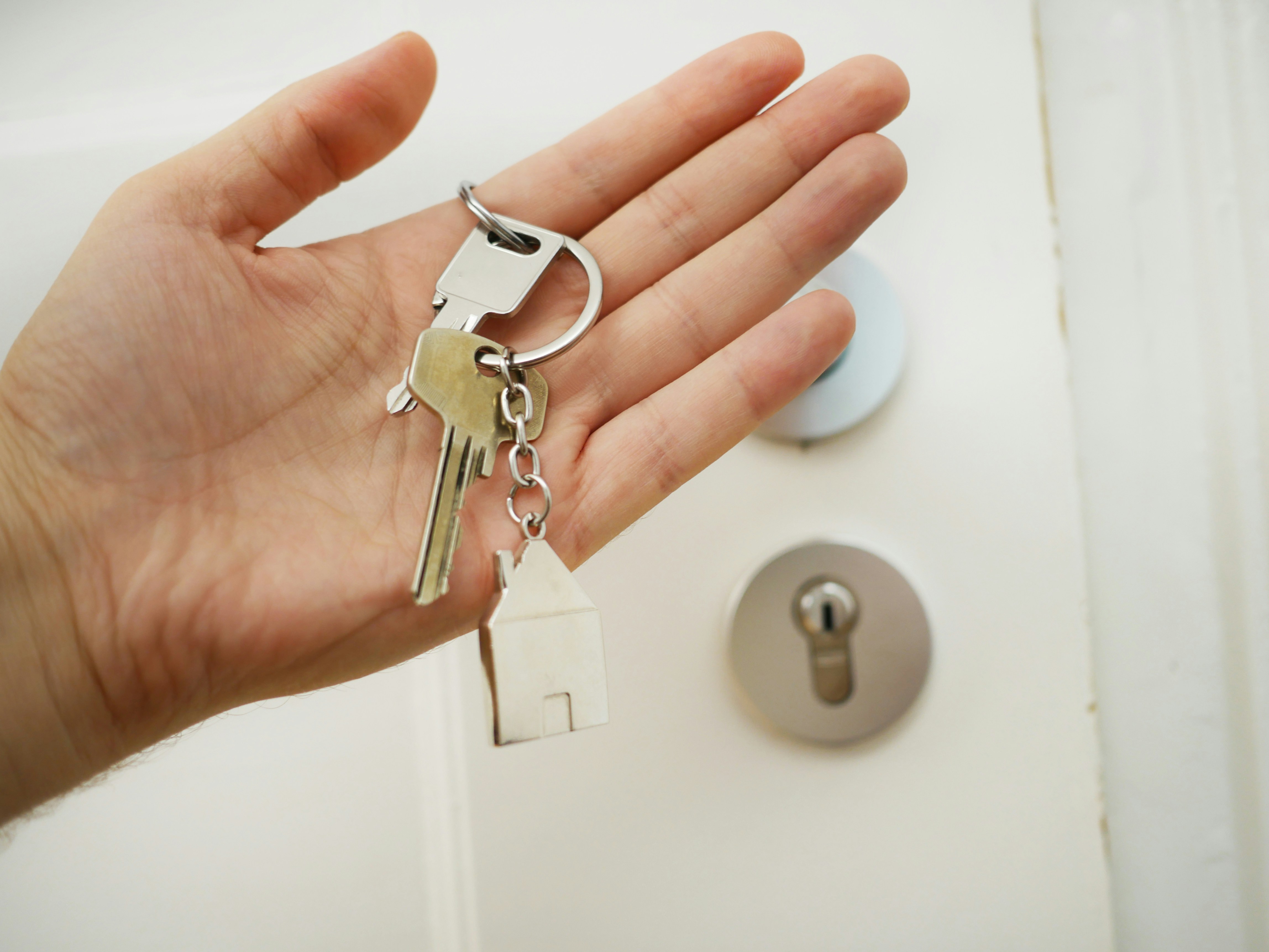 House keys being handed over, representing Rhonda's Denver home buying guide